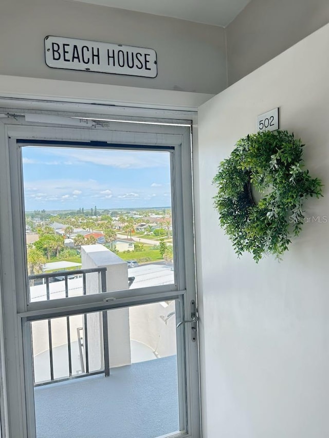 2860 Ocean Shore Blvd Unit 5020, Ormond Beach, FL 32176 - doorway with healthy amount of natural light