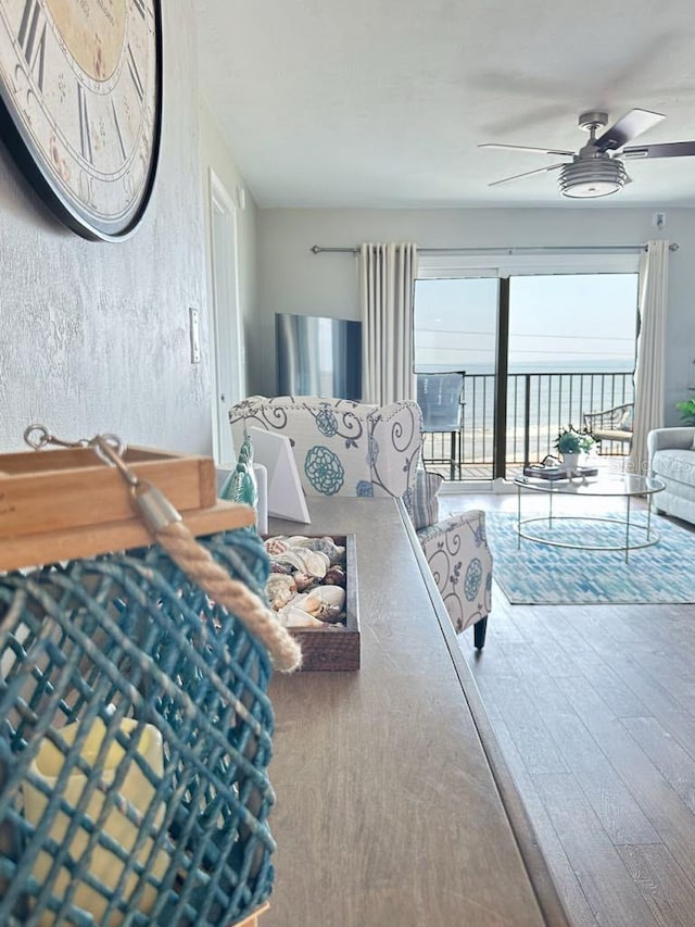 2860 Ocean Shore Blvd Unit 5020, Ormond Beach, FL 32176 - bedroom featuring access to exterior, wood finished floors, and a ceiling fan