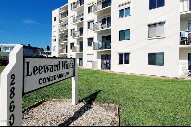 2860 Ocean Shore Blvd Unit 5020, Ormond Beach, FL 32176 - community / neighborhood sign featuring a lawn