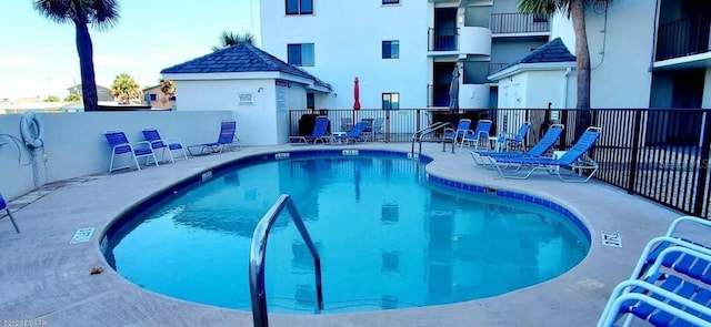 2860 Ocean Shore Blvd Unit 5020, Ormond Beach, FL 32176 - community pool featuring a patio area