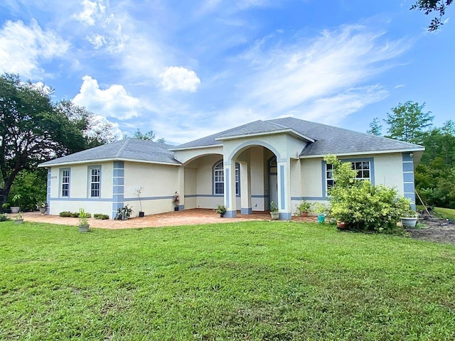 19320 Oberly Pkwy, Orlando, FL 32833 - single story home featuring stucco siding, a front yard, and a shingled roof