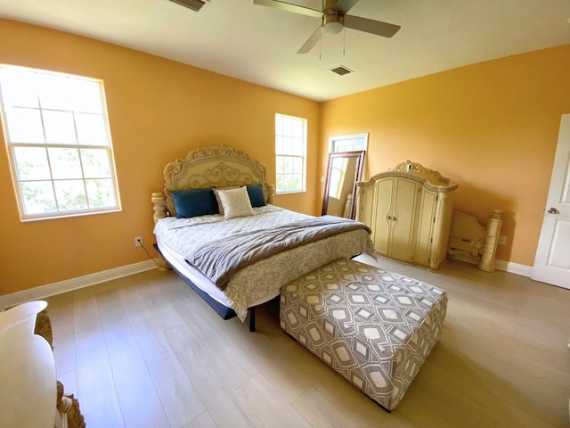 19320 Oberly Pkwy, Orlando, FL 32833 - bedroom featuring light wood-type flooring and ceiling fan