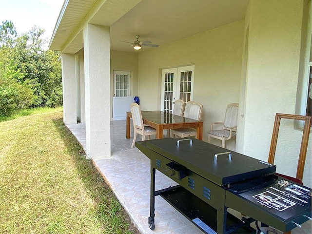 19320 Oberly Pkwy, Orlando, FL 32833 - view of patio / terrace with french doors, a ceiling fan, and outdoor dining area