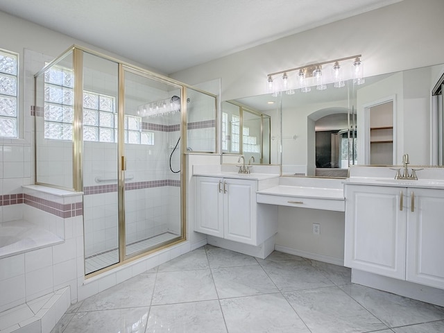 5936 Boggs Ford Rd, Port Orange, FL 32127 - full bath with a shower stall, double vanity, and a garden tub
