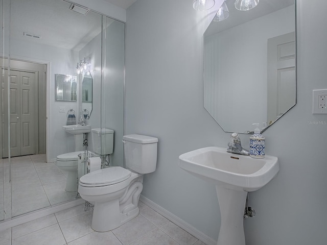 5936 Boggs Ford Rd, Port Orange, FL 32127 - half bath with toilet and tile patterned flooring