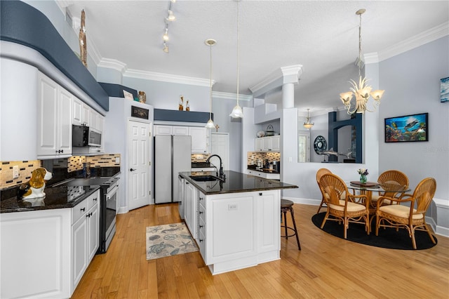 801 Arbor Glen Ct, Ormond Beach, FL 32174 - kitchen featuring stainless steel appliances, decorative backsplash, ornamental molding, white cabinetry, and a chandelier