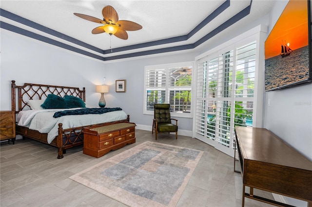 801 Arbor Glen Ct, Ormond Beach, FL 32174 - bedroom featuring a raised ceiling, ceiling fan, and light tile patterned floors