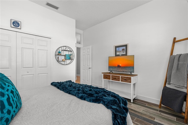 801 Arbor Glen Ct, Ormond Beach, FL 32174 - bedroom featuring wood finished floors and a closet