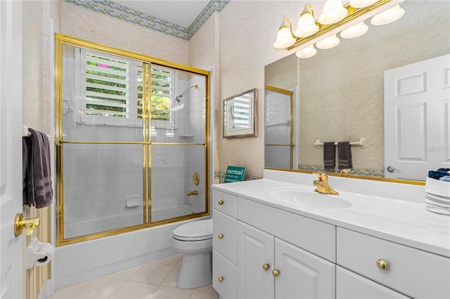 801 Arbor Glen Ct, Ormond Beach, FL 32174 - bathroom featuring vanity, tile patterned floors, shower / bath combination with glass door, and wallpapered walls
