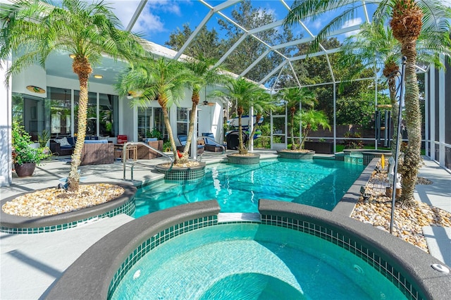 801 Arbor Glen Ct, Ormond Beach, FL 32174 - view of pool featuring a patio area, a pool with connected hot tub, an outdoor hangout area, and glass enclosure