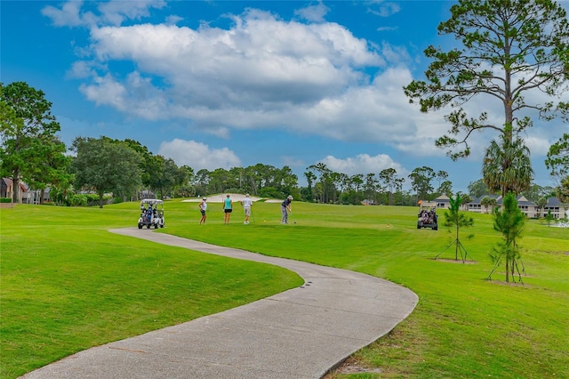 801 Arbor Glen Ct, Ormond Beach, FL 32174 - surrounding community featuring a lawn and golf course view