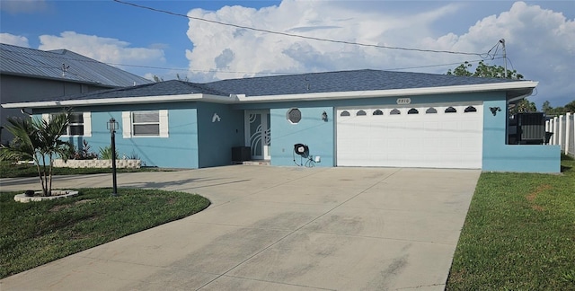 3510 Magnolia Way, Punta Gorda, FL 33950 - single story home featuring concrete driveway, stucco siding, a garage, roof with shingles, and a front lawn