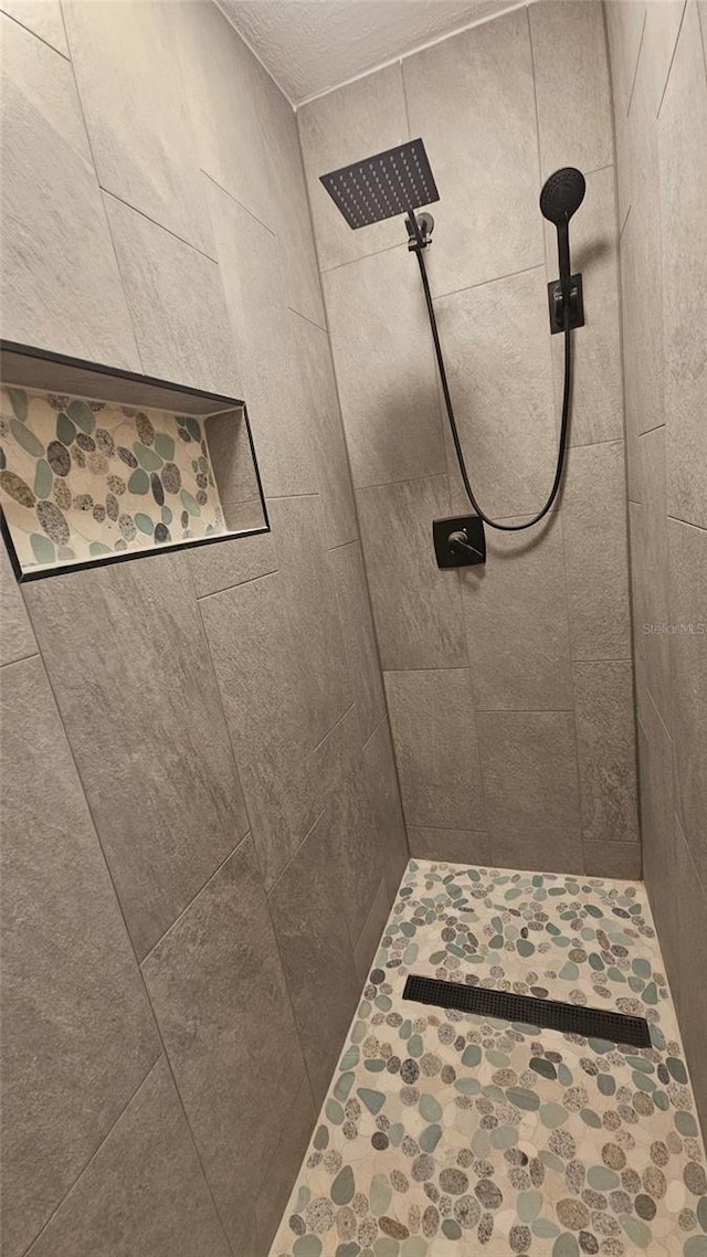 3510 Magnolia Way, Punta Gorda, FL 33950 - bathroom featuring a tile shower