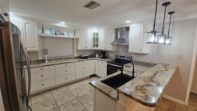 3510 Magnolia Way, Punta Gorda, FL 33950 - kitchen featuring wall chimney range hood, stainless steel appliances, a peninsula, white cabinets, and crown molding