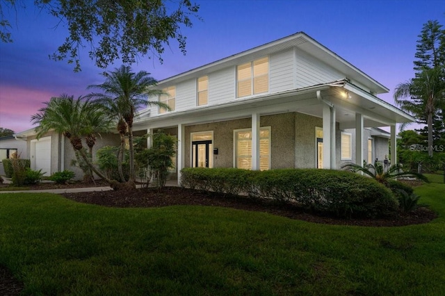 113 Neptune Ave, Ormond Beach, FL 32176 - view of front of property featuring a front yard and covered porch