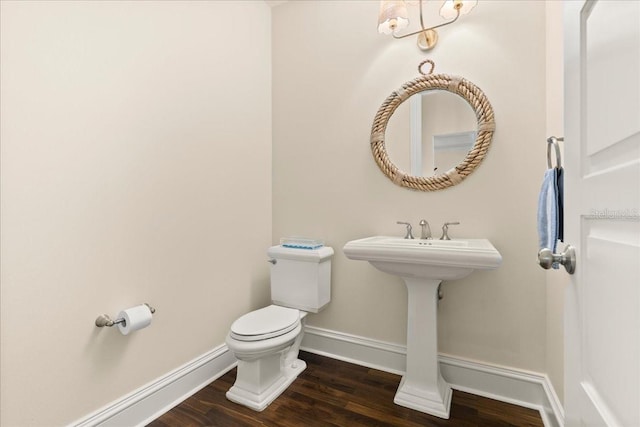 113 Neptune Ave, Ormond Beach, FL 32176 - half bath with wood finished floors and toilet