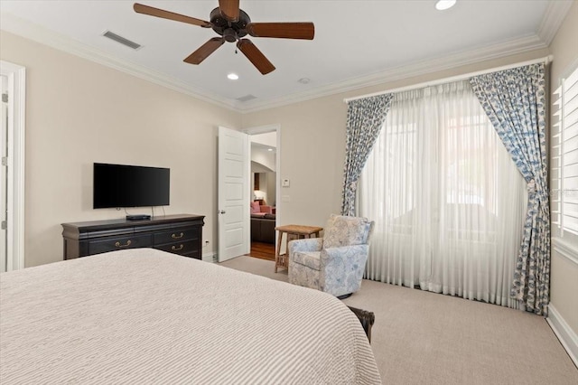 113 Neptune Ave, Ormond Beach, FL 32176 - bedroom featuring crown molding, arched walkways, recessed lighting, a ceiling fan, and carpet flooring