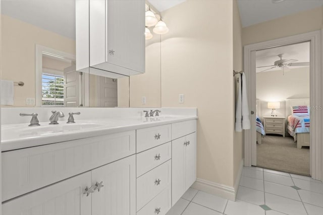 113 Neptune Ave, Ormond Beach, FL 32176 - bathroom with ensuite bath, double vanity, tile patterned floors, and a ceiling fan
