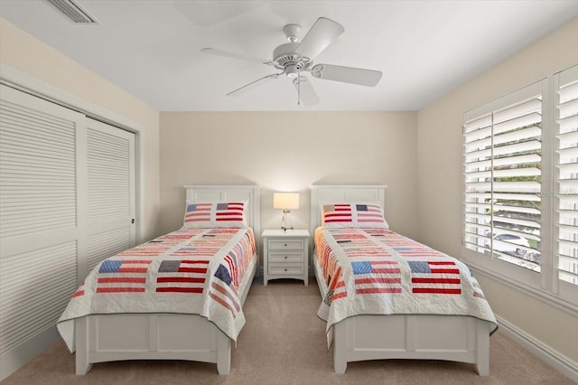 113 Neptune Ave, Ormond Beach, FL 32176 - bedroom with carpet, a closet, and ceiling fan