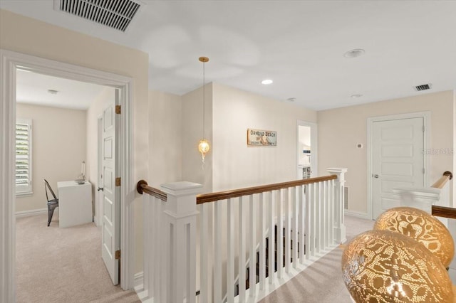 113 Neptune Ave, Ormond Beach, FL 32176 - corridor with an upstairs landing, light colored carpet, and recessed lighting
