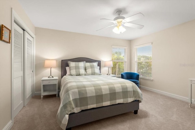 113 Neptune Ave, Ormond Beach, FL 32176 - carpeted bedroom featuring a closet and a ceiling fan
