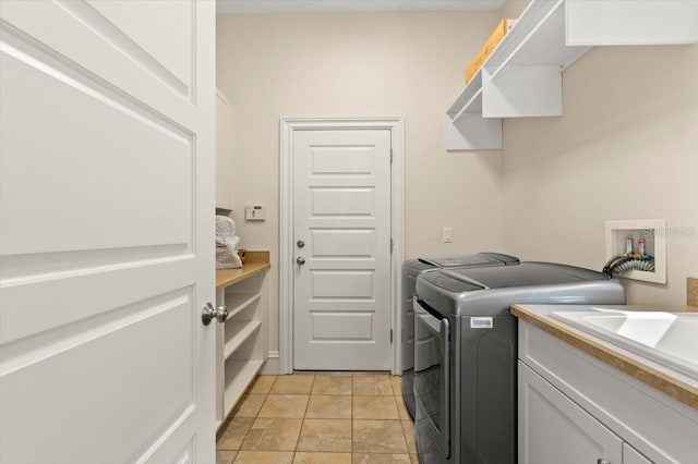113 Neptune Ave, Ormond Beach, FL 32176 - laundry area with washer and clothes dryer and cabinet space