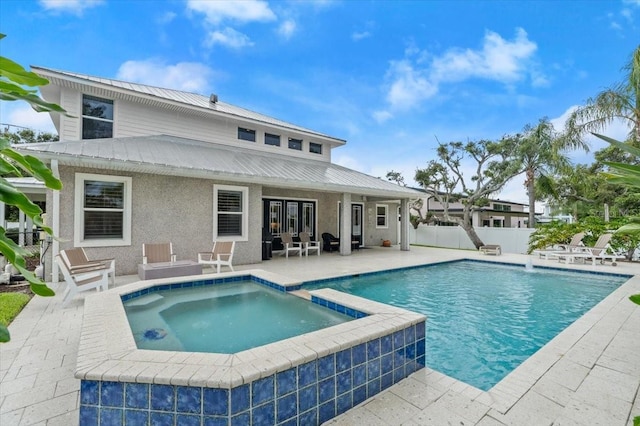 113 Neptune Ave, Ormond Beach, FL 32176 - view of pool with a patio area and a pool with connected hot tub