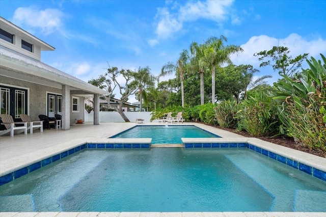113 Neptune Ave, Ormond Beach, FL 32176 - view of pool featuring a patio area, a fenced backyard, and a pool with connected hot tub