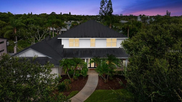 113 Neptune Ave, Ormond Beach, FL 32176 - view of front of property featuring a metal roof