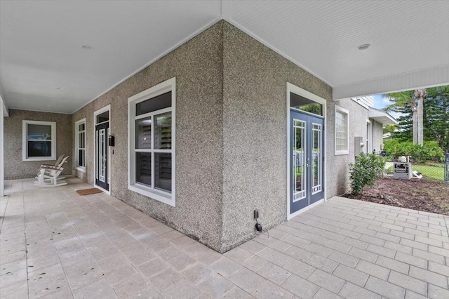 113 Neptune Ave, Ormond Beach, FL 32176 - view of patio / terrace featuring french doors