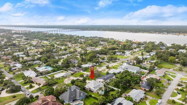113 Neptune Ave, Ormond Beach, FL 32176 - aerial overview of property's location featuring a nearby body of water, a notable bridge, and nearby suburban area