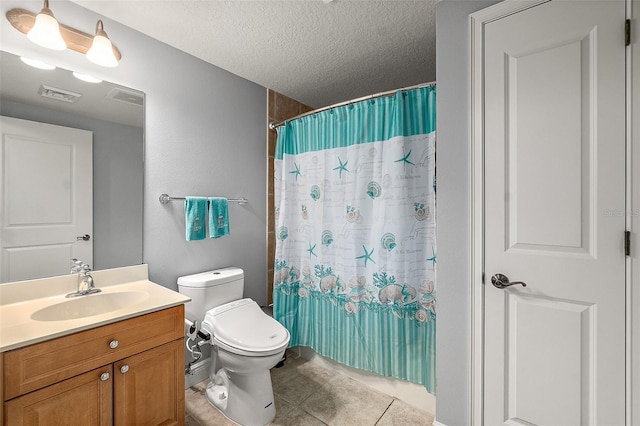 2901 S Atlantic Ave Unit 603, Daytona Beach Shores, FL 32118 - full bath featuring vanity, tile patterned floors, a textured ceiling, and a shower with curtain
