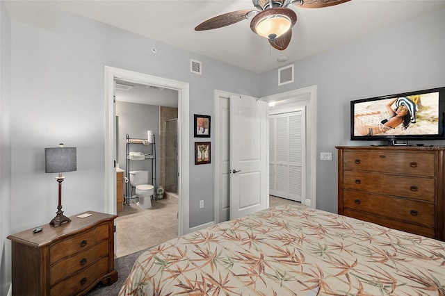 2901 S Atlantic Ave Unit 603, Daytona Beach Shores, FL 32118 - bedroom featuring light tile patterned floors, ensuite bath, and ceiling fan