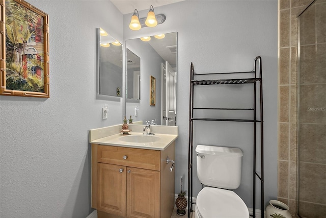 2901 S Atlantic Ave Unit 603, Daytona Beach Shores, FL 32118 - bathroom with vanity, a textured wall, and tiled shower
