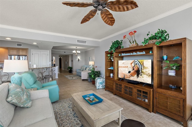 2901 S Atlantic Ave Unit 603, Daytona Beach Shores, FL 32118 - living room with a chandelier, a ceiling fan, ornamental molding, light tile patterned flooring, and a textured ceiling