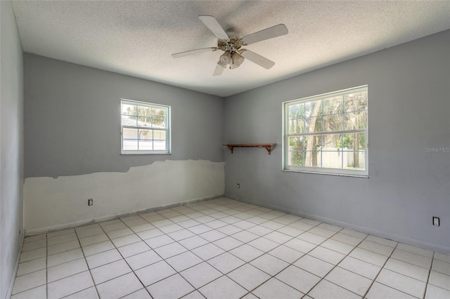 1624 Queen Palm Dr, Edgewater, FL 32132 - empty room featuring ceiling fan and a textured ceiling