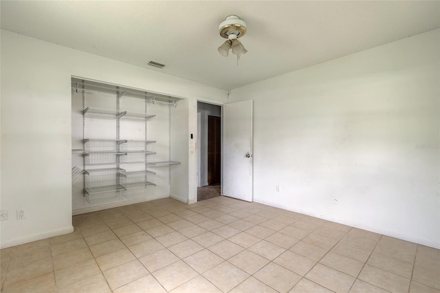 1624 Queen Palm Dr, Edgewater, FL 32132 - unfurnished bedroom featuring baseboards and a closet