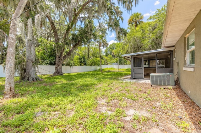 1624 Queen Palm Dr, Edgewater, FL 32132 - fenced backyard featuring a sunroom