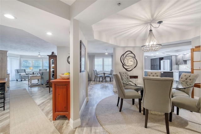 1 John Anderson Dr Unit 1030, Ormond Beach, FL 32176 - dining area with light wood-type flooring, a chandelier, and recessed lighting