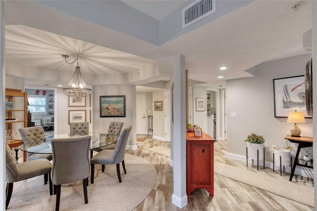 1 John Anderson Dr Unit 1030, Ormond Beach, FL 32176 - dining room featuring light wood-type flooring, a chandelier, and recessed lighting
