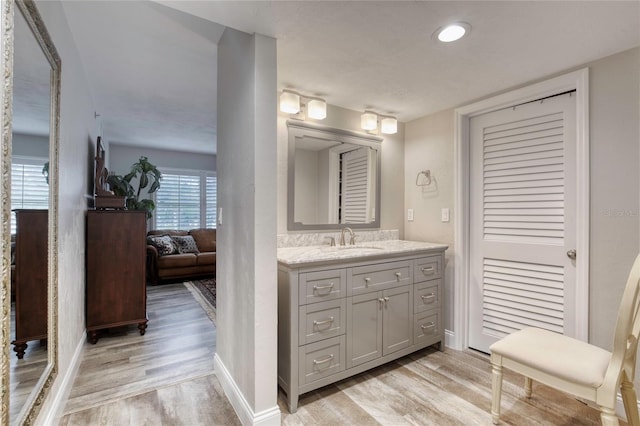 1 John Anderson Dr Unit 1030, Ormond Beach, FL 32176 - bathroom with wood finished floors and vanity