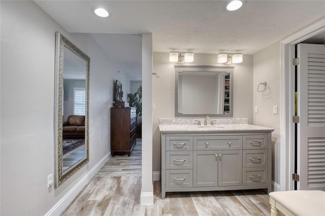 1 John Anderson Dr Unit 1030, Ormond Beach, FL 32176 - bathroom with wood finished floors and vanity