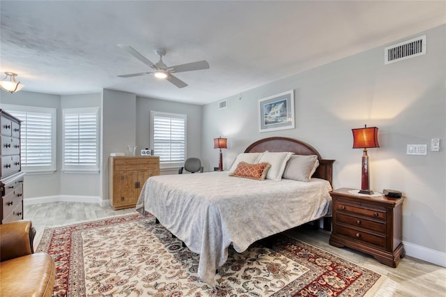 1 John Anderson Dr Unit 1030, Ormond Beach, FL 32176 - bedroom with wood finished floors and a ceiling fan