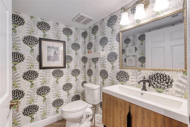 1 John Anderson Dr Unit 1030, Ormond Beach, FL 32176 - bathroom featuring vanity and wallpapered walls