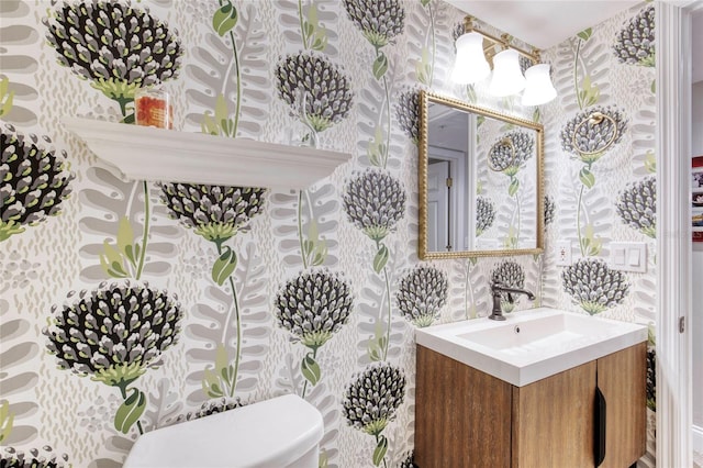 1 John Anderson Dr Unit 1030, Ormond Beach, FL 32176 - half bathroom with wallpapered walls and vanity