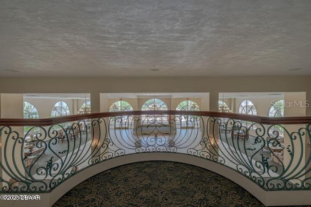 1 John Anderson Dr Unit 1030, Ormond Beach, FL 32176 - hall with a textured ceiling