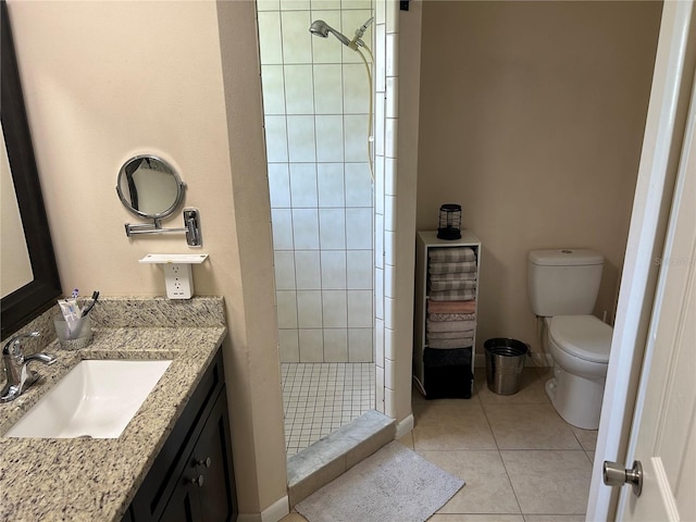879 S Hancock Dr, Deltona, FL 32725 - full bathroom featuring vanity, tiled shower, and tile patterned floors