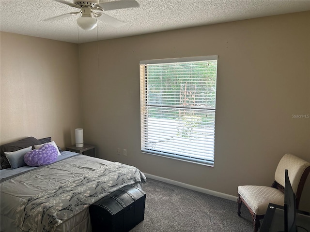 879 S Hancock Dr, Deltona, FL 32725 - bedroom with carpet, a textured ceiling, and ceiling fan