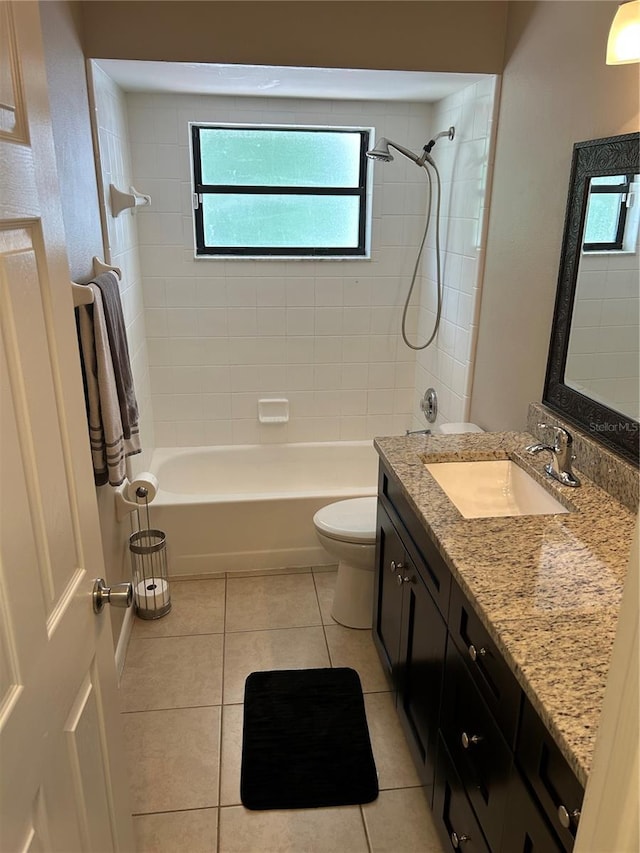879 S Hancock Dr, Deltona, FL 32725 - bathroom with vanity, shower / washtub combination, and tile patterned flooring