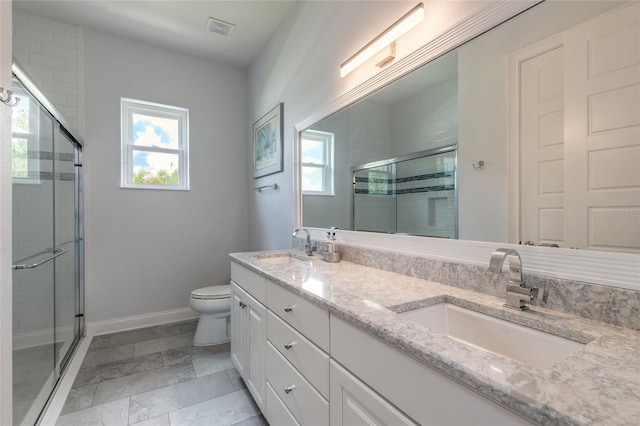 2816 E Venetian Lake Cir, New Smyrna Beach, FL 32168 - full bathroom with healthy amount of natural light, a shower stall, and double vanity